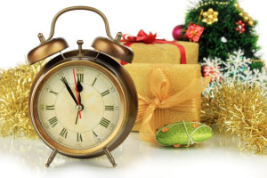 Composition of clock and christmas decorations isolated on